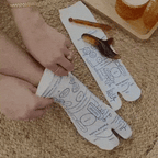 kit reflexologia podal: meias com mapa e massageador terapêutico